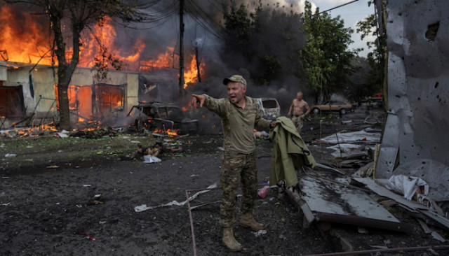 Foreign Military personnel at the scene of the Missile strike